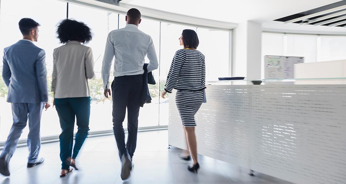 employees walking and talking