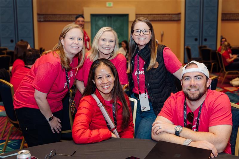 employees posing for a group shot